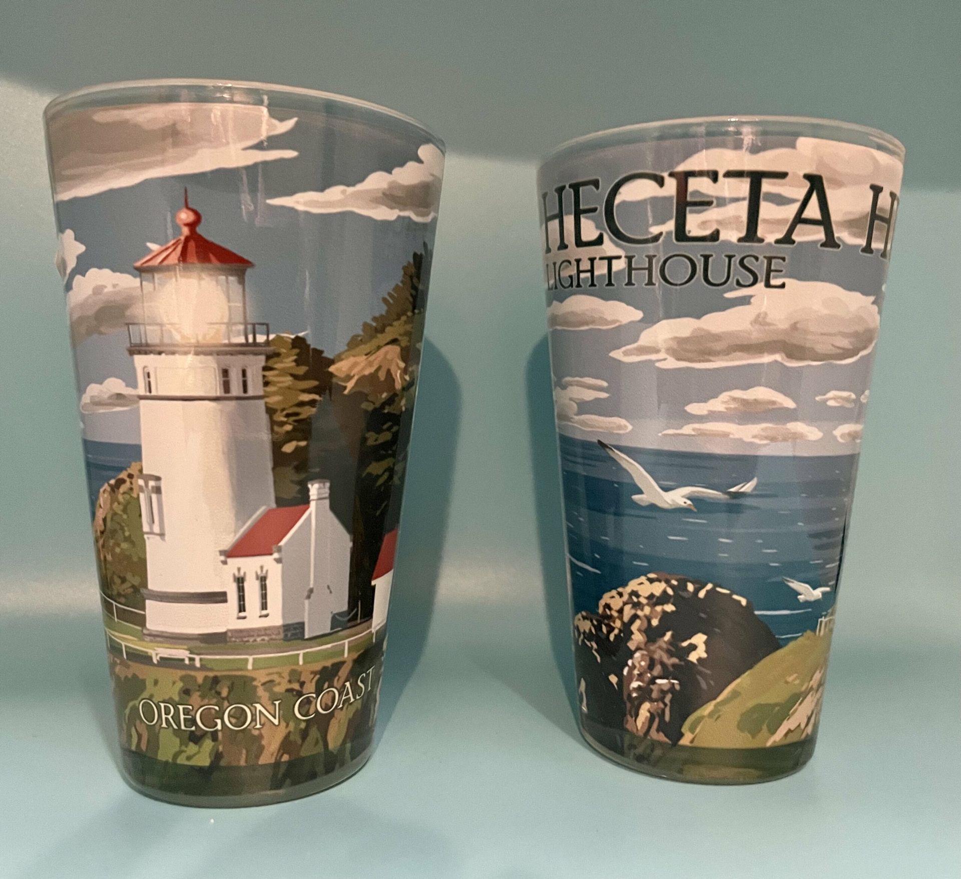 Two glasses with the word lighthouse on them