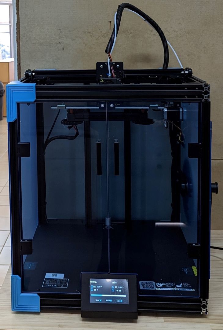 A 3d Printer is Sitting on a Wooden Table — Lismore Computer Solutions in Kyogle, NSW