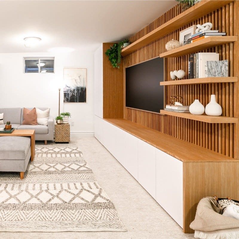 A living room with a couch and a flat screen tv