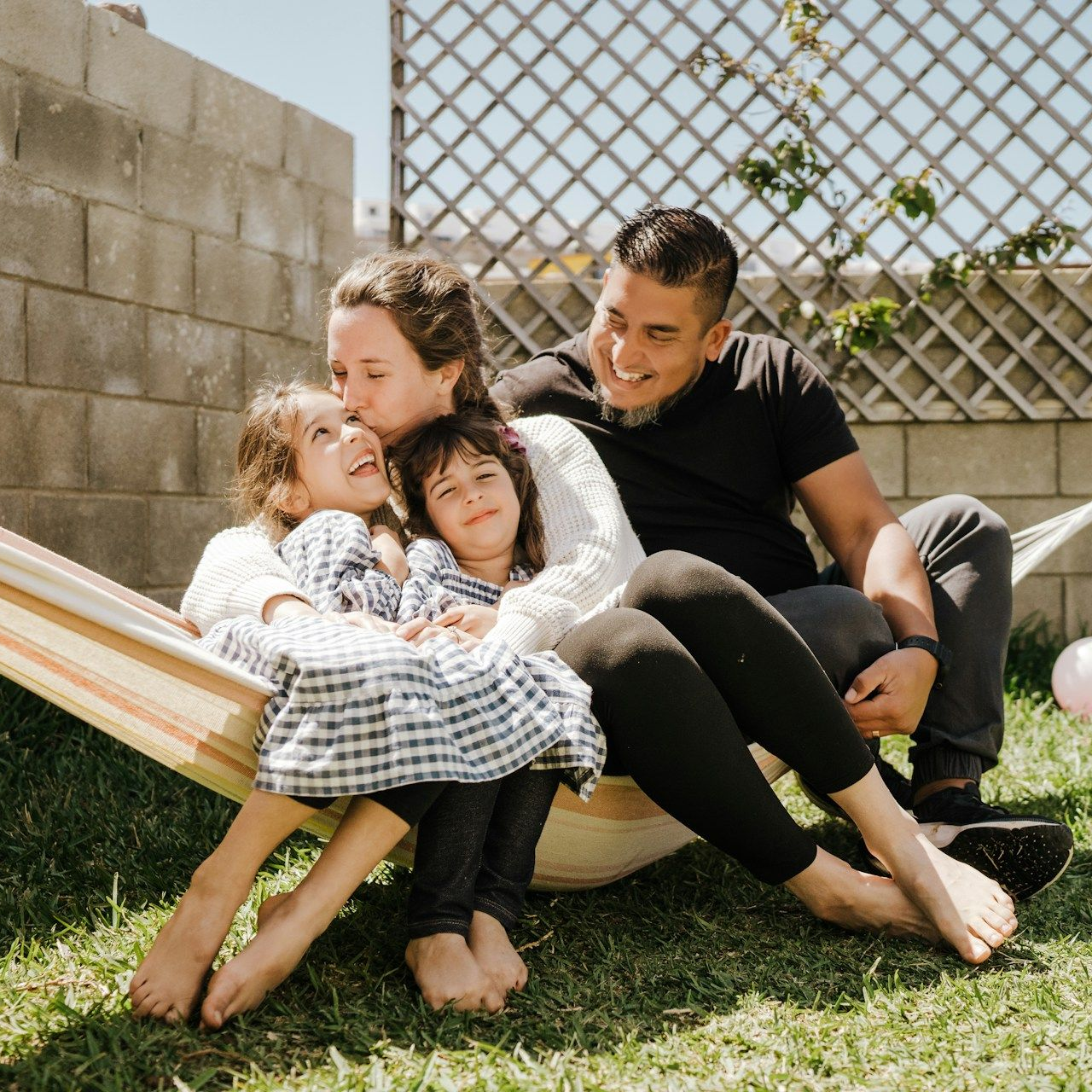Two beagle dogs are sitting in the back of a vehicle.