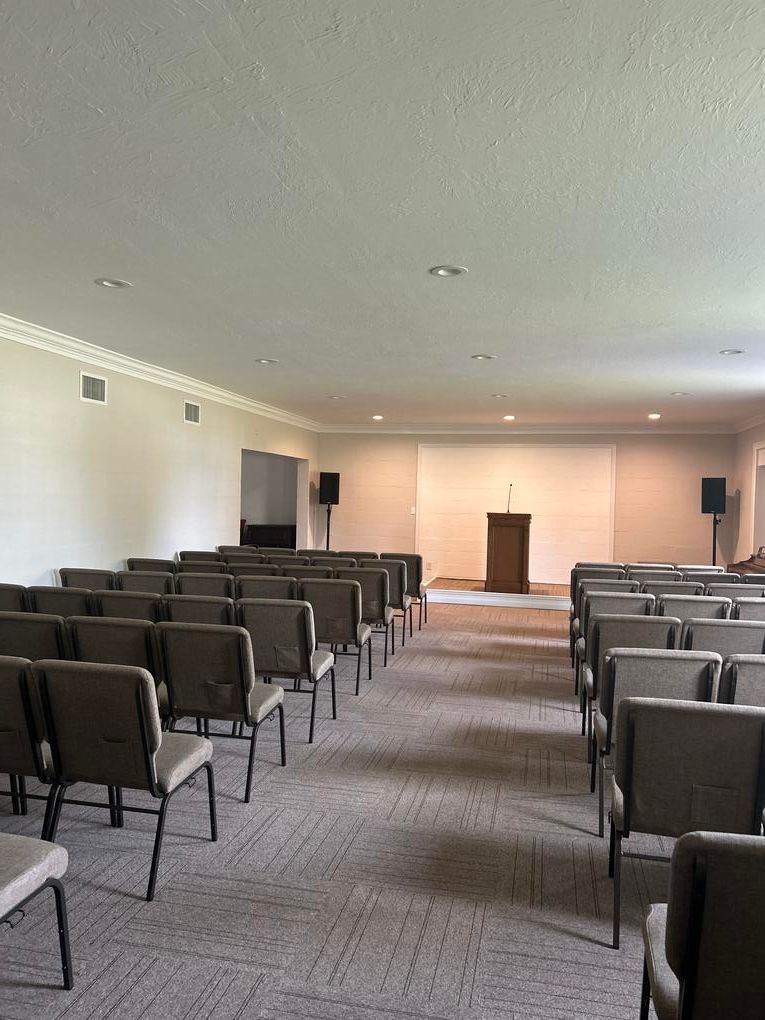 There is a coffin in the middle of the living room.