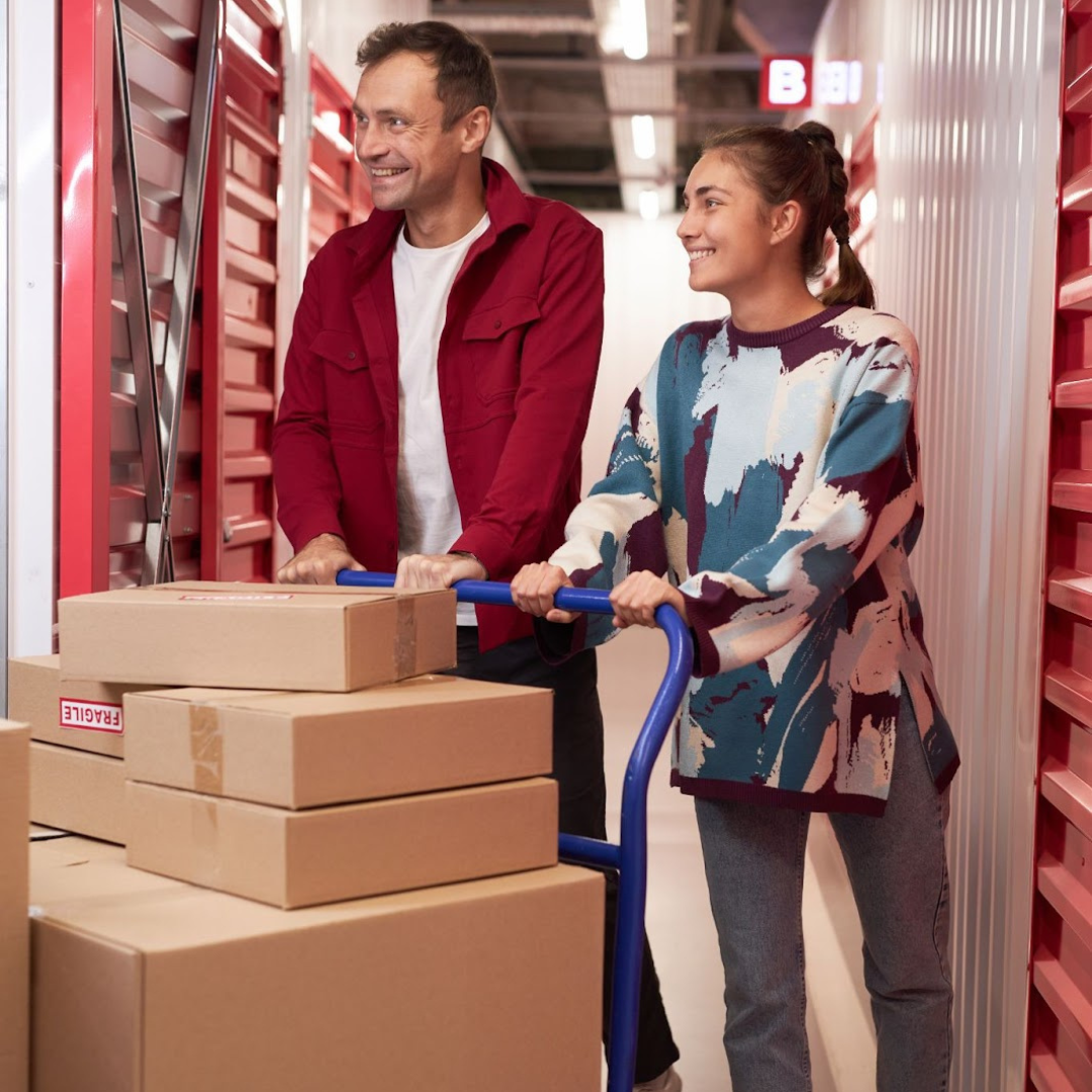 People moving into a storage unit