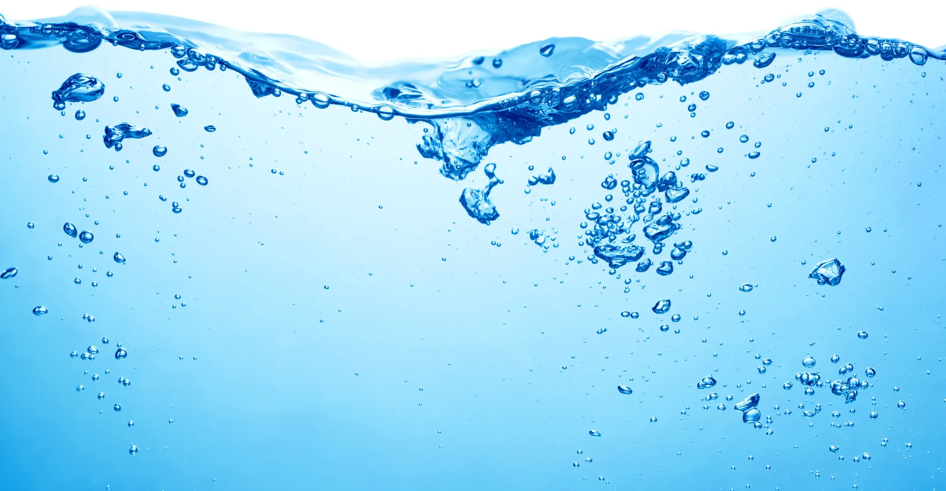 Blue water with bubbles rising to the surface — Highlands Water Cartage in Glenquarry, NSW