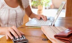 Woman Checking Her Account Online — Budget Rent-A-Space in Keizer, OR