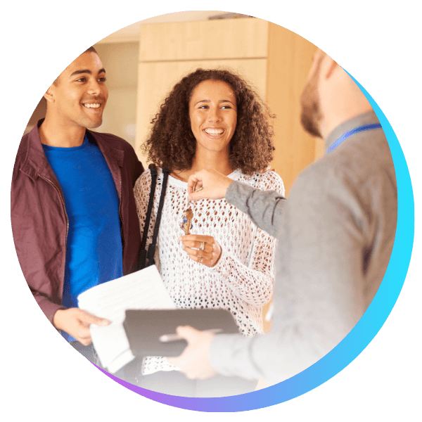 property manager handing new tenants their keys