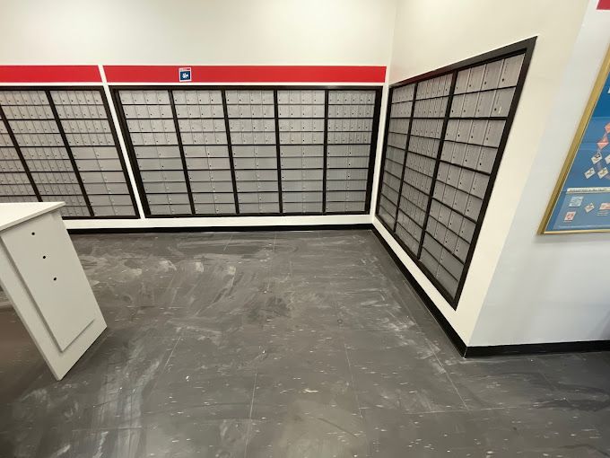 A room with a lot of mailboxes on the wall