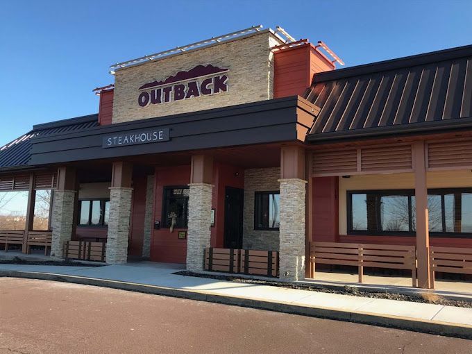 The outside of a restaurant called outback steakhouse