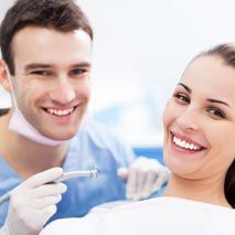 Patient with dentures — Dental Services in Durham, NC