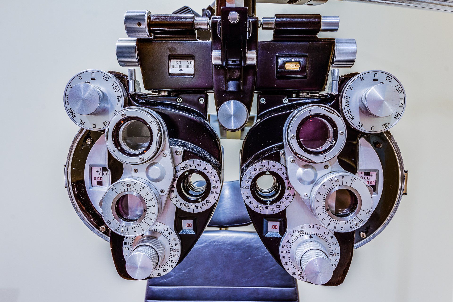 A close up of an eye examination machine on a table
