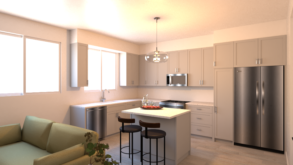 A living room with a couch and a kitchen with stainless steel appliances.