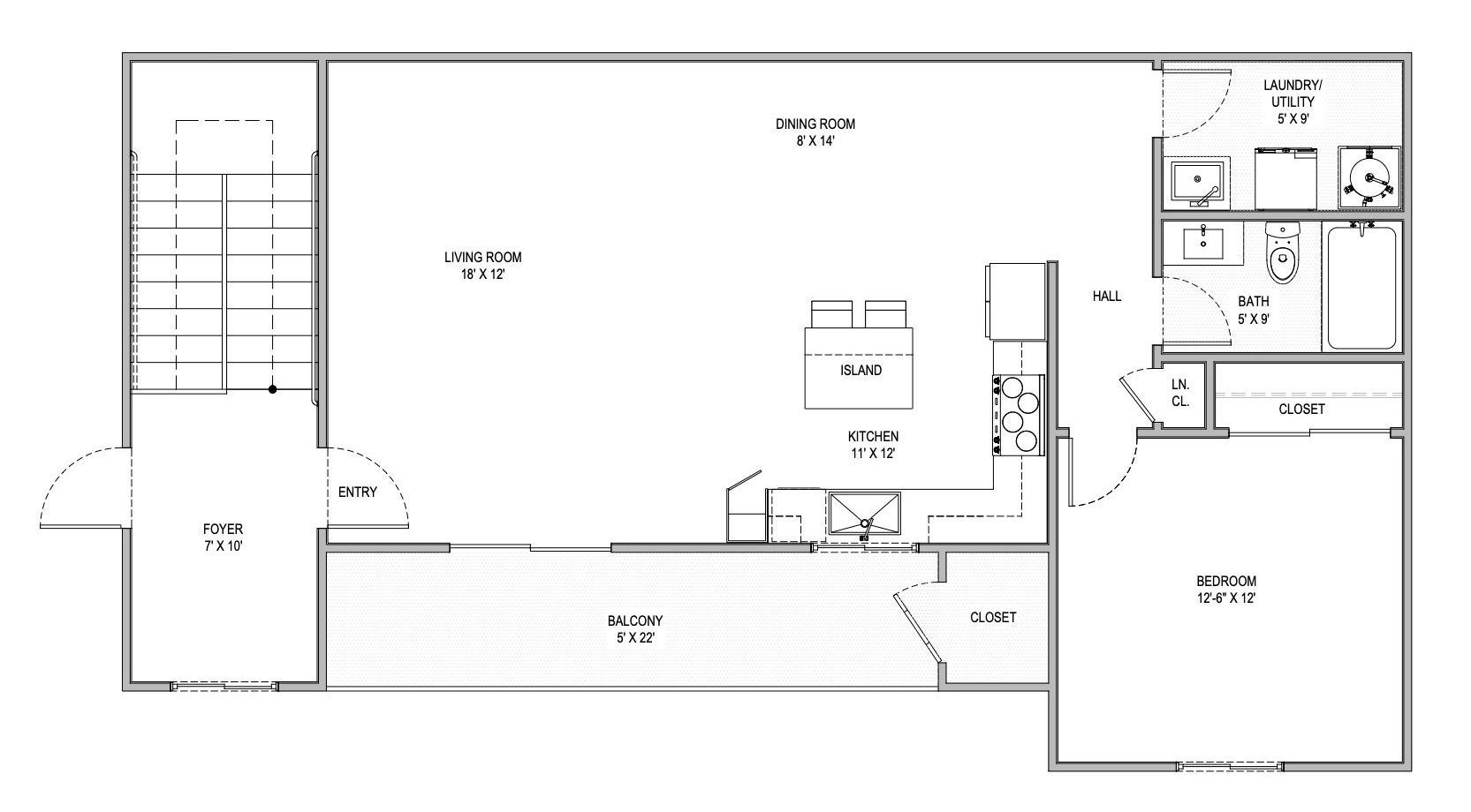 A black and white floor plan of a house with a kitchen and stairs.