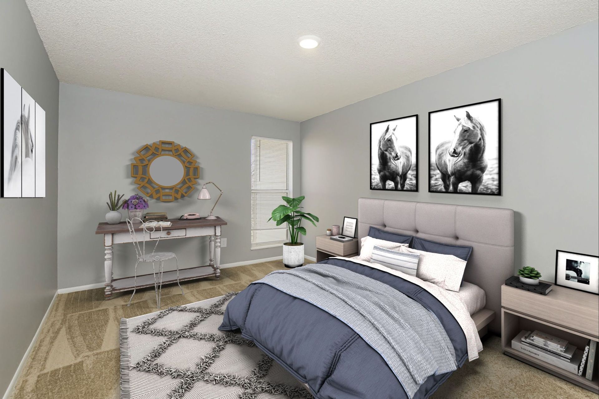 Bedroom with bed, desk, artwork, neutral color scheme.