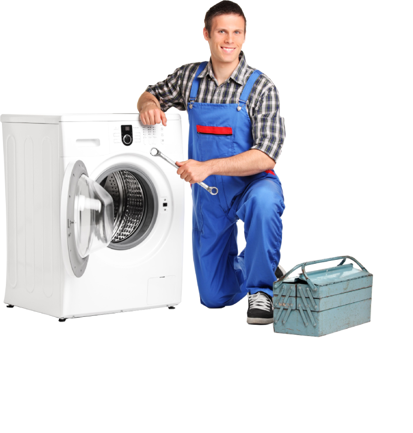 A man is kneeling next to a washing machine holding a wrench.