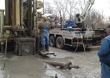 Worker Water drilling rigs underground — Well Drilling in Port Murray, NJ