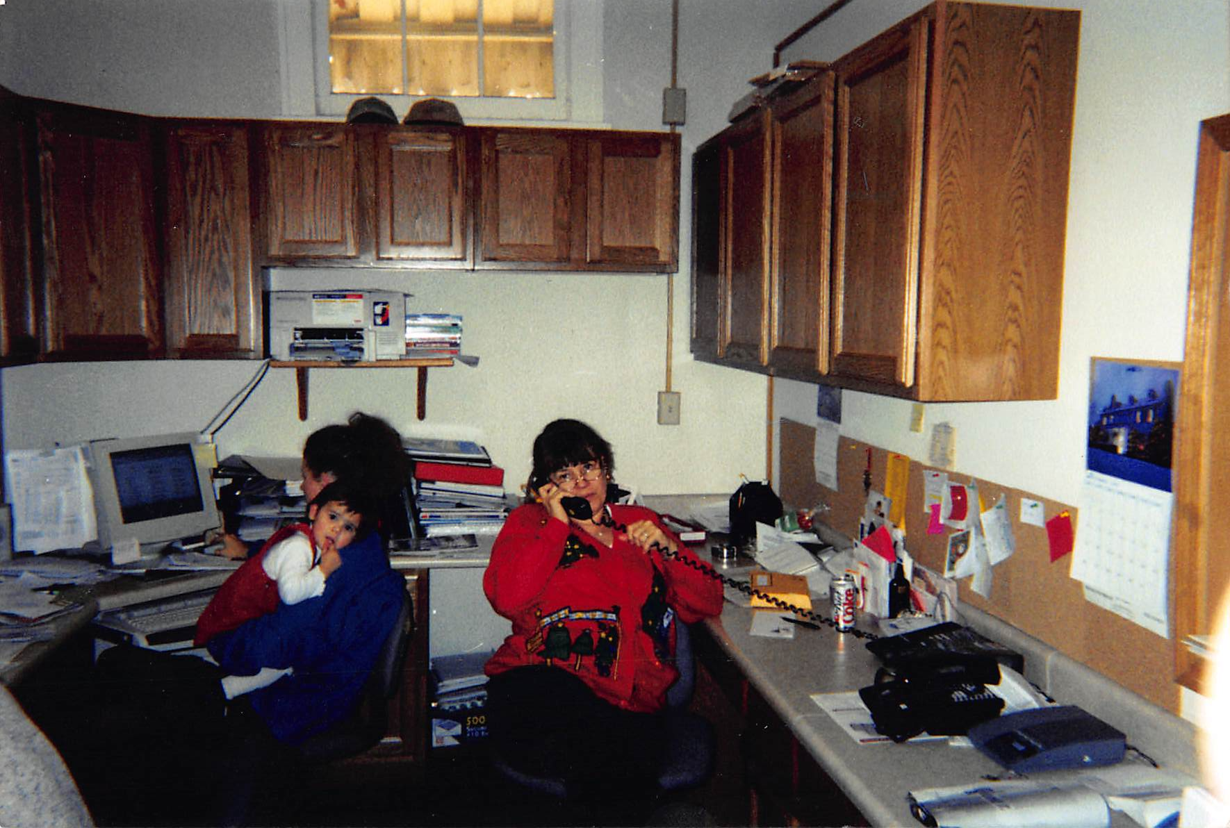 Weida office staff team on phone - photo of early days