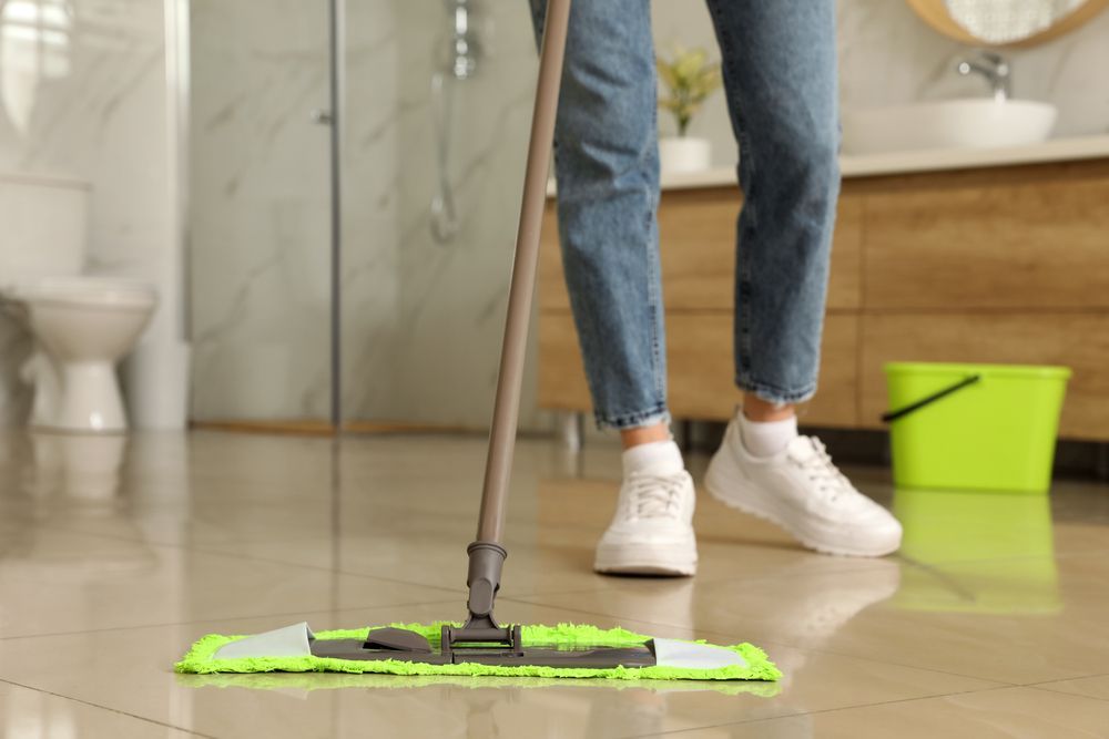 mopping apartment bathoom floor