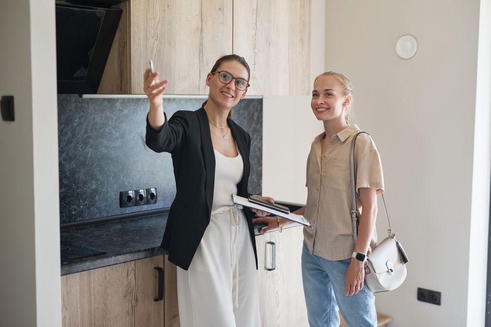 property manager showing an apartment to a new tenant