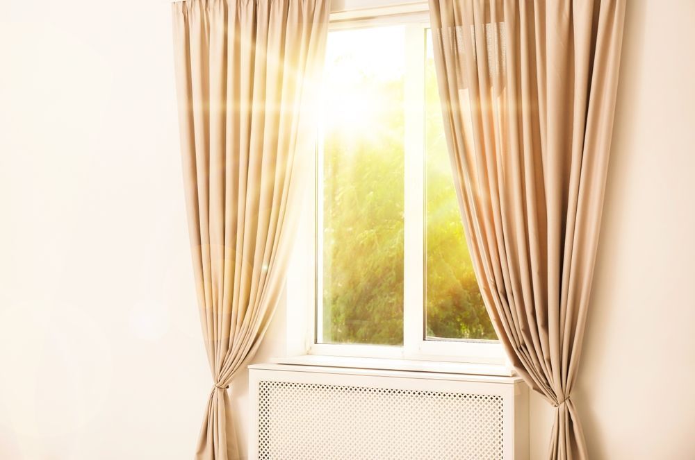 The sun shines to keep the apartment warm in the winter.