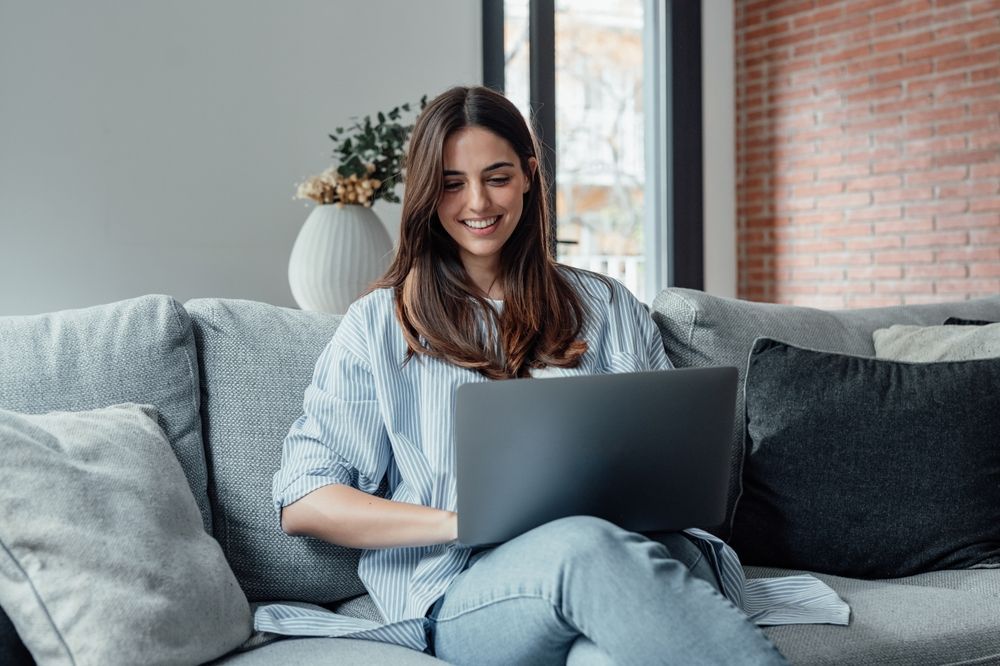 woman shopping online for apartment furniture