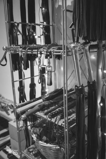 A collection of floggers used in ConSensual practices, symbolizing conscious touch and exploration, photographed by Sam Kauranne (Studio ES).