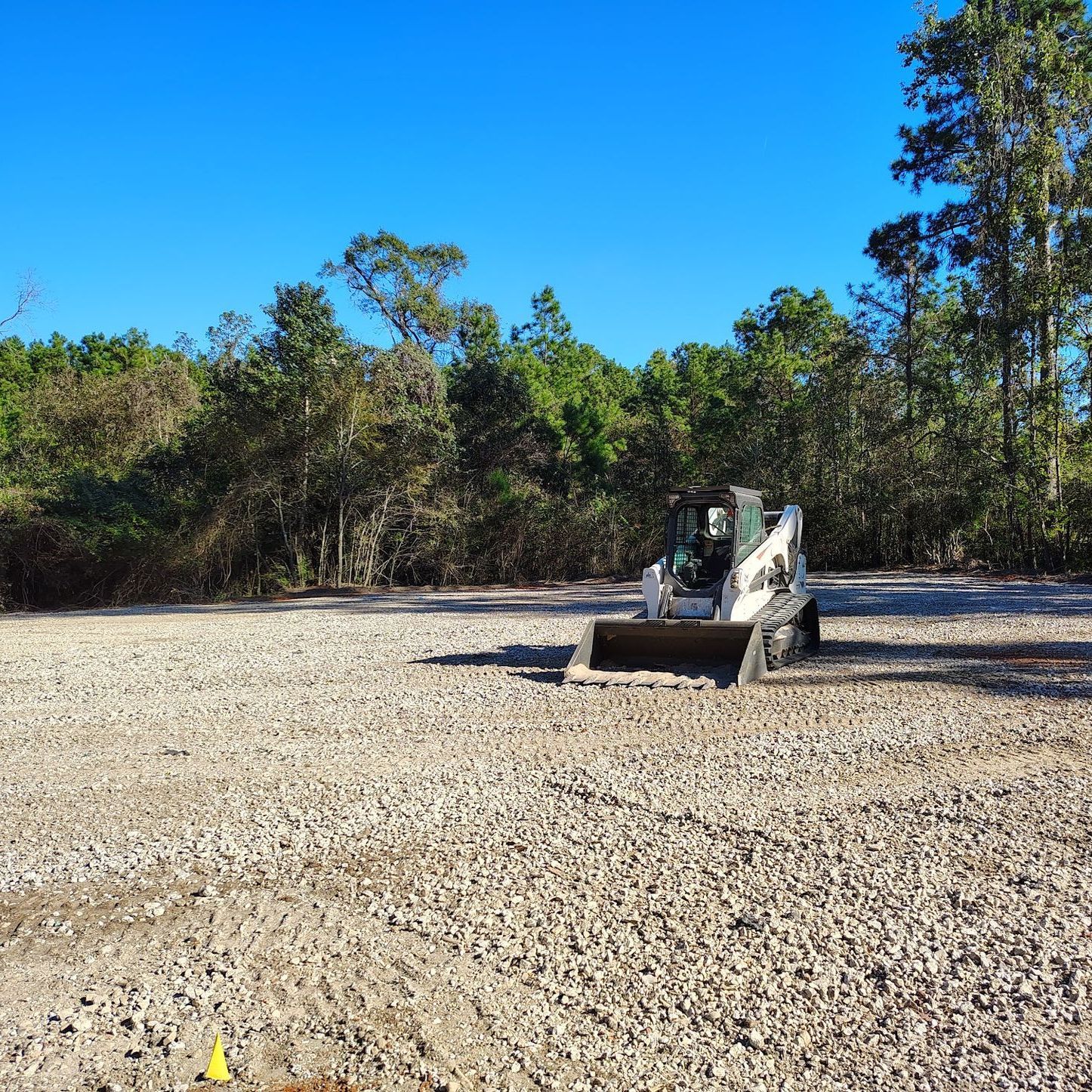 Gravel parking lot installed near Cleveland, TX. 