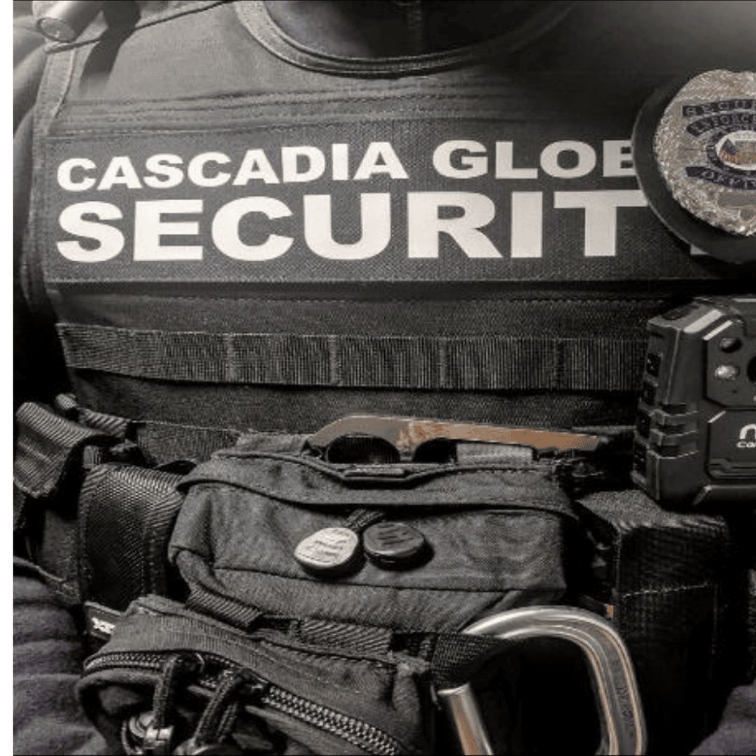 A man wearing a vest that says cascadia gloe security