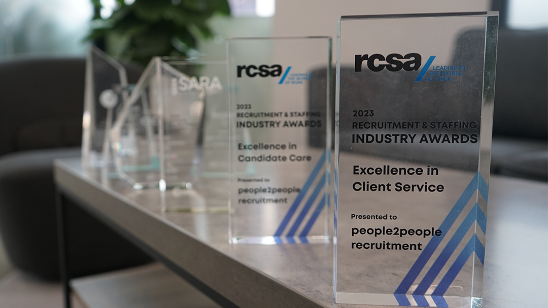 Awards on a shelf, including 