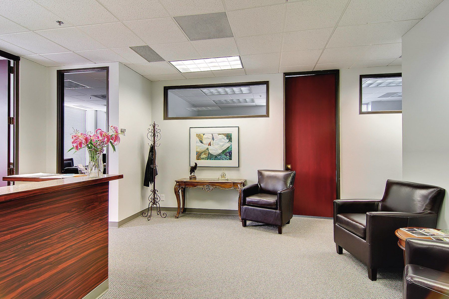 lobby area with arm chairs and side tables