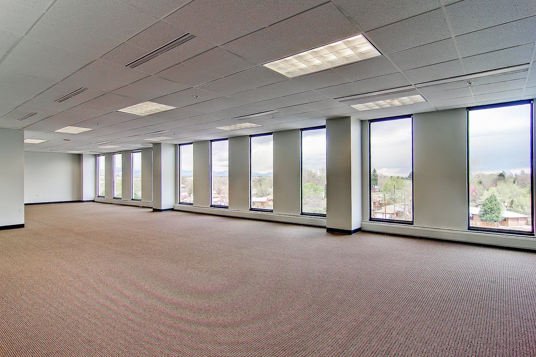 spacious open room with windows