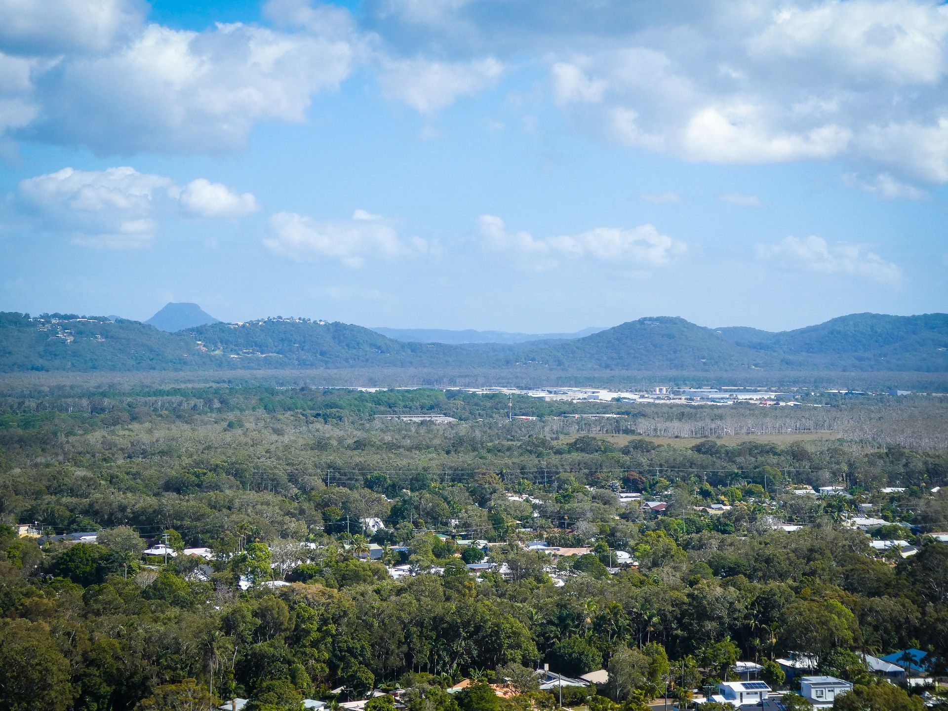 Sunny Landscape With a Town Nestled in Trees — Sonke Support Pty. Ltd. in Coolum, QLD