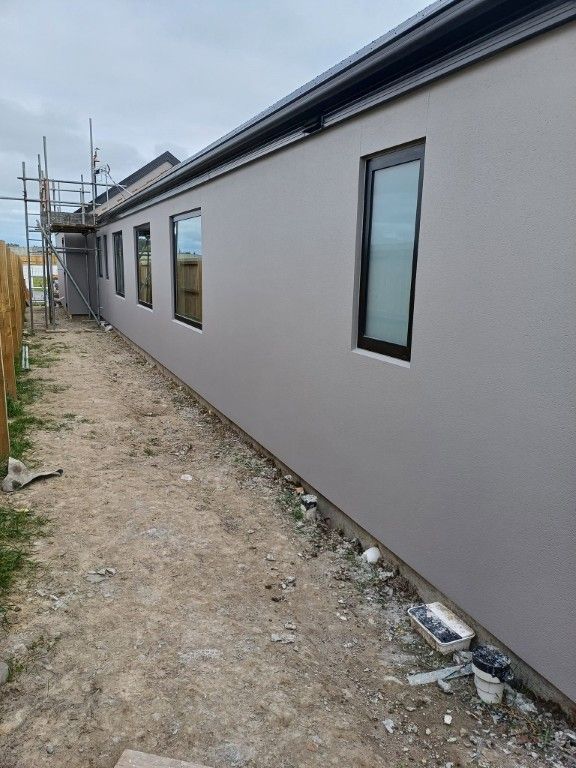 A row of windows on the side of a building