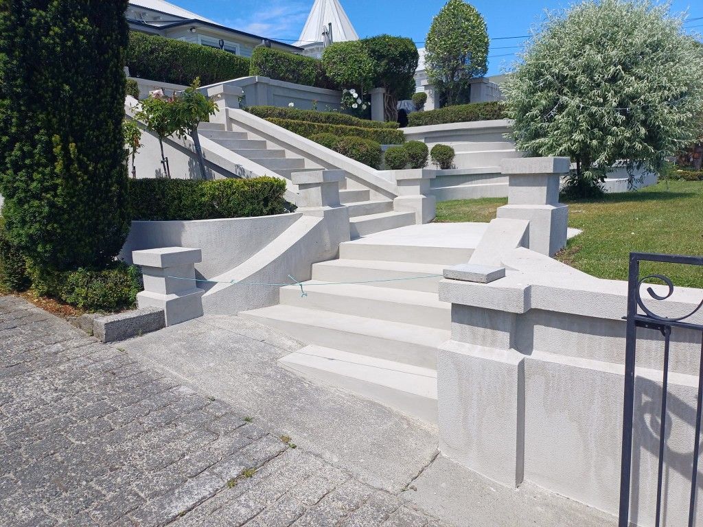 A set of stairs leading up to a house.