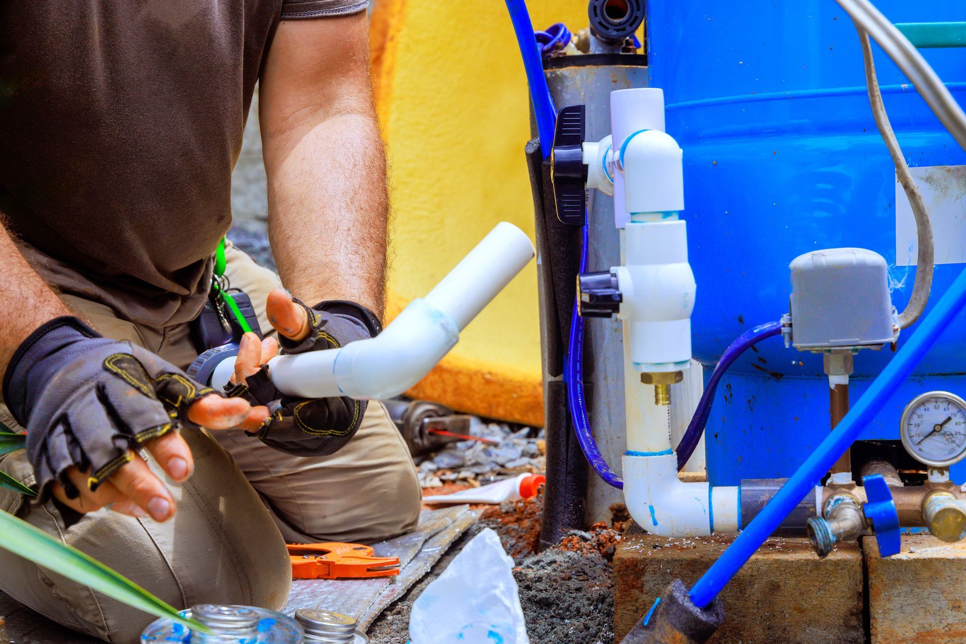Plumber assembling connection for water well to household water system. Plumber assembling connection for water well to household water system.
