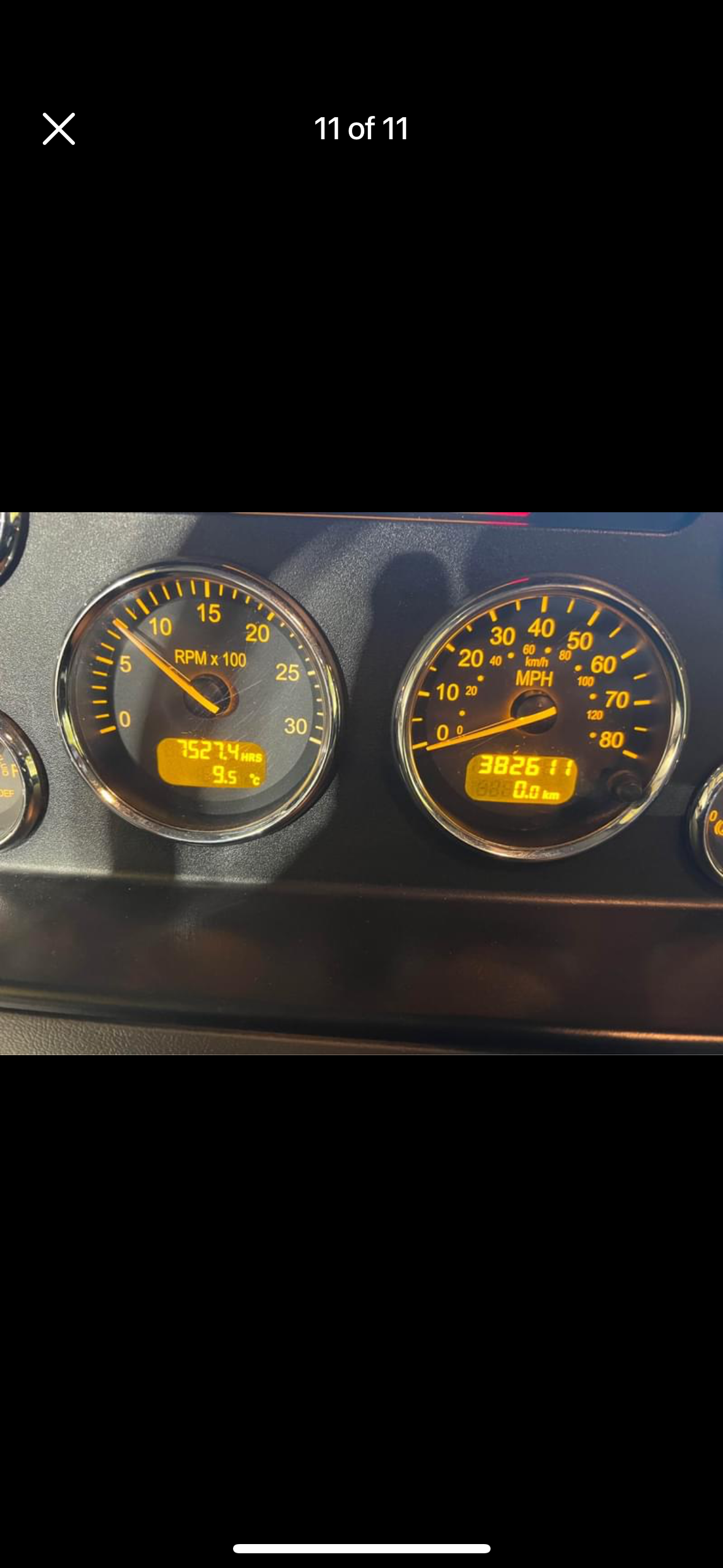 A close up of a dashboard with a lot of gauges on it.