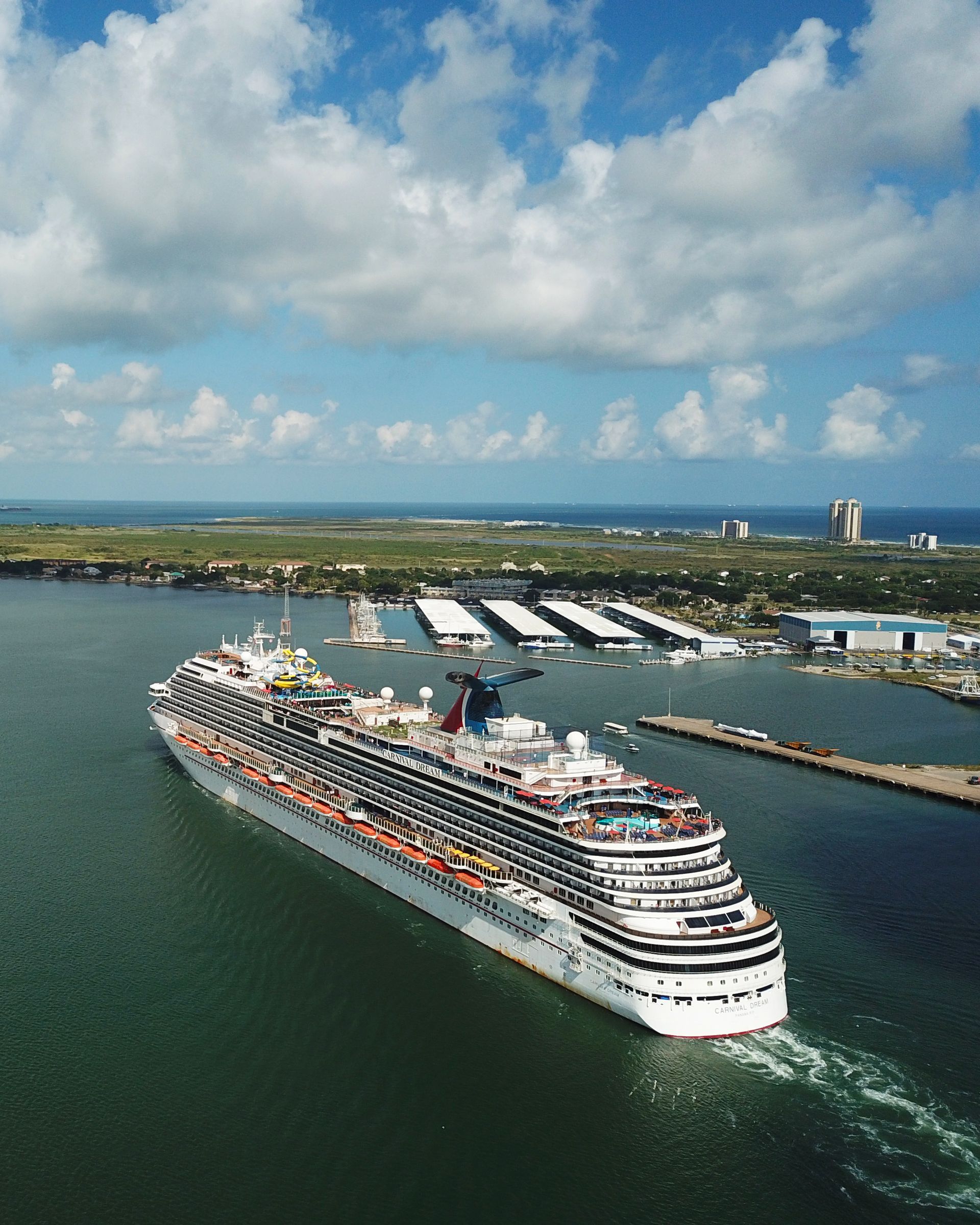 An aerial view of a cruise ship in the water