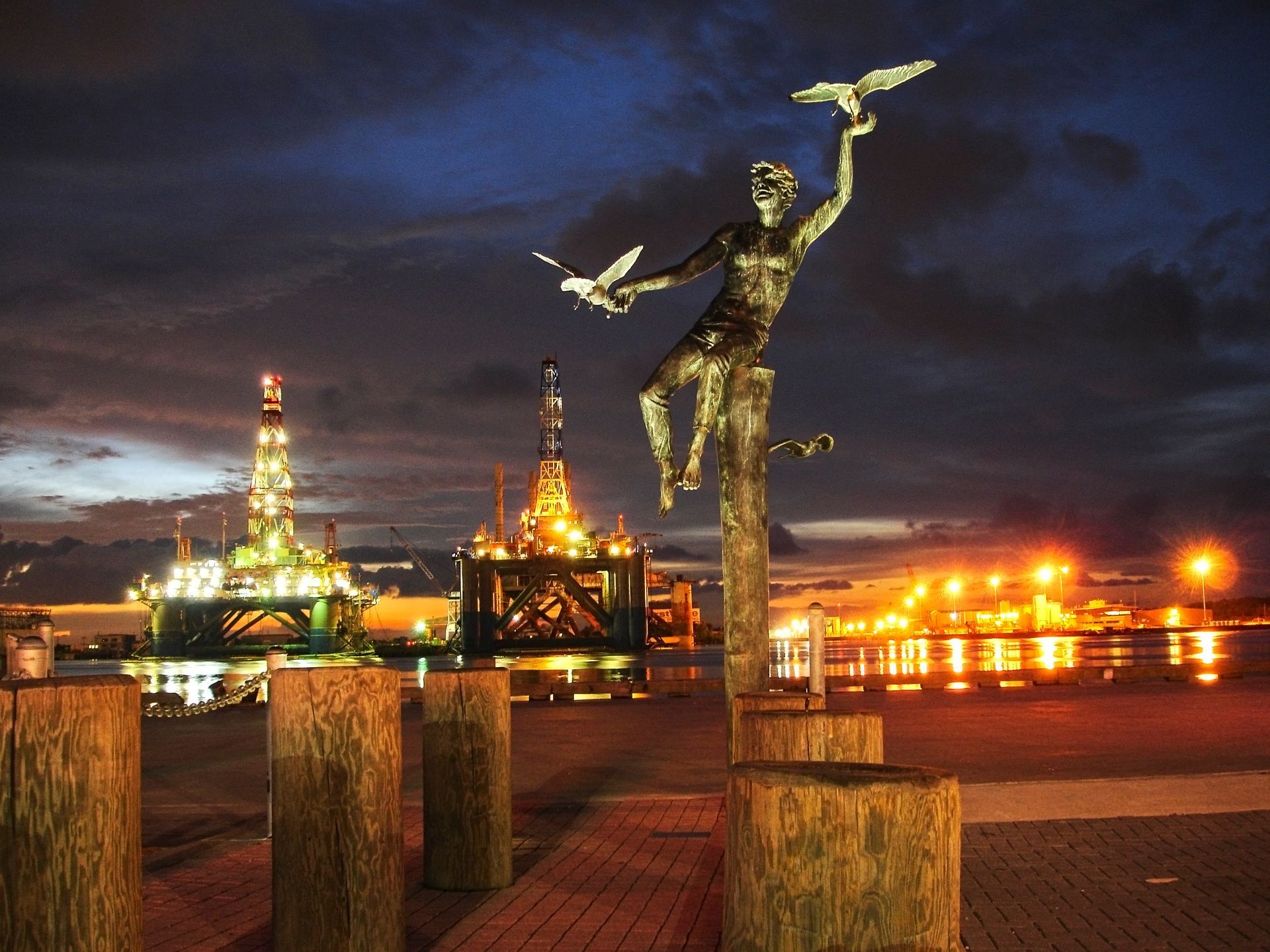 A statue of a man with a bird in his hand
