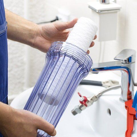 Plumber Installing New Water Filtration System — Water Filtration in Bundaberg, QLD