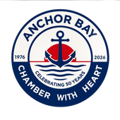 Anchor Bay Chamber of Commerce logo featuring a black anchor, blue/red dots, and text on a blue circle.