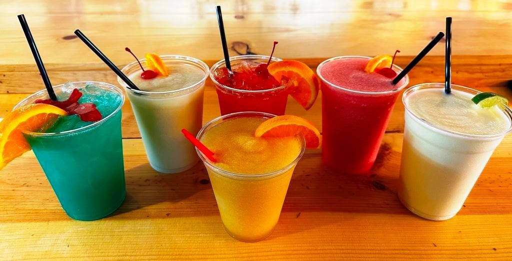 We offer boozy smoothies, slushies and ice cream shakes at On The Bay restaurant and coffee and tiki bar