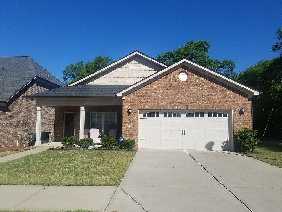 House with Driveway — Grovetown, GA — Gutters and More