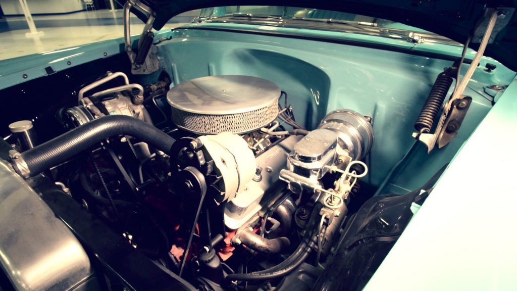 Classic blue car engine bay.