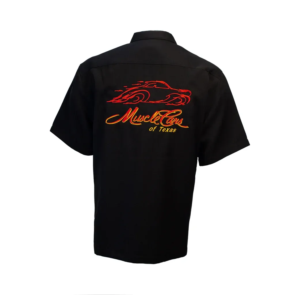 Black button-down shirt with short sleeves; orange script logo on left chest.