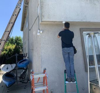 Boss Security Systems installing a security camera system at a home in Oakdale CA