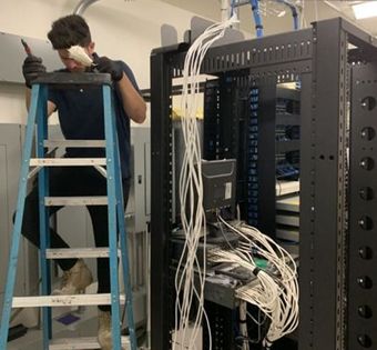 Boss Security Systems Installing wiring in a server room