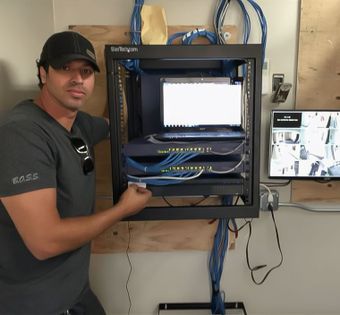 Boss Security Systems owner with a completed CCTV Security camera system