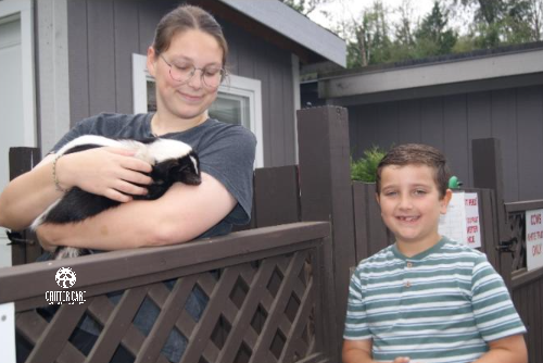 Daniel and mom with skunk