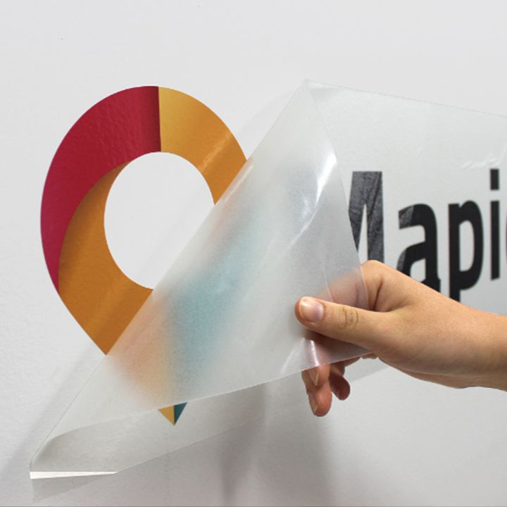 A person is holding a piece of paper with the word api on it