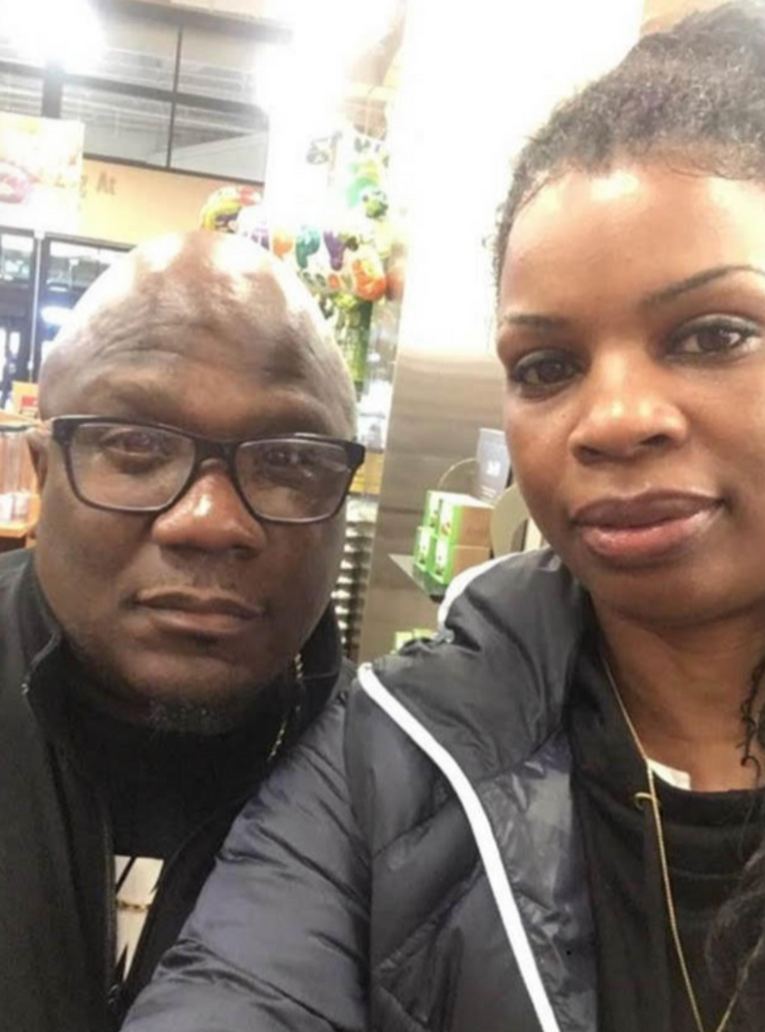 A man and a woman are posing for a picture together