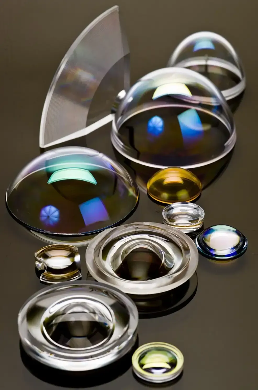 A bunch of different types of lenses on a table