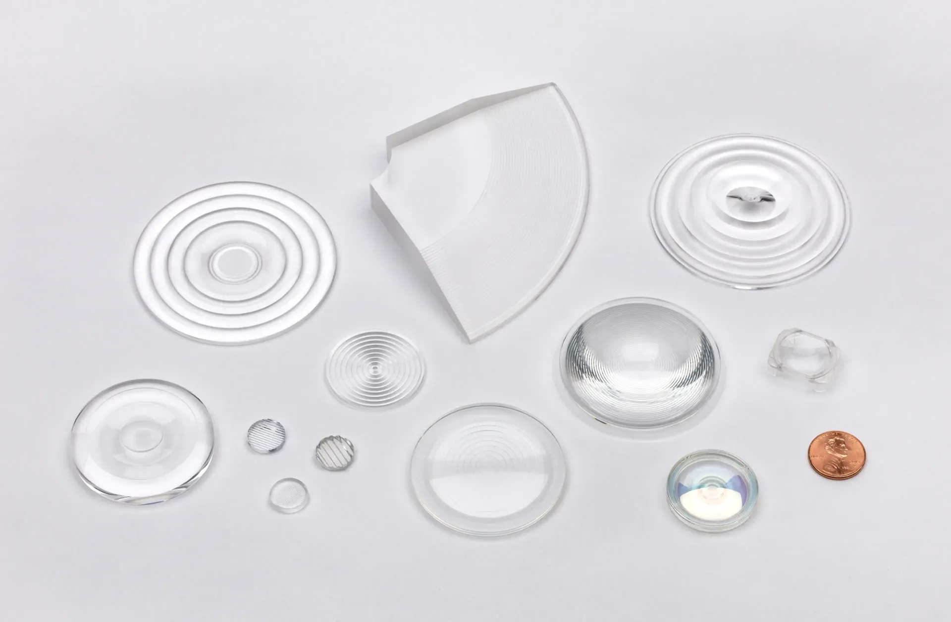 There are many different types of lenses on the table.